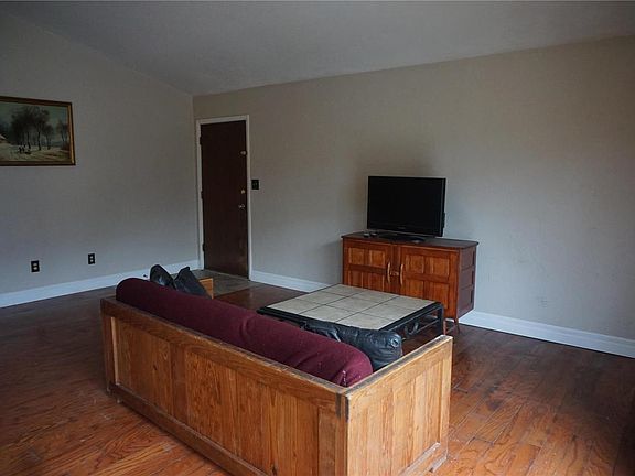 Living/Great Room has new 5inch baseboards & vaulted ceiling.