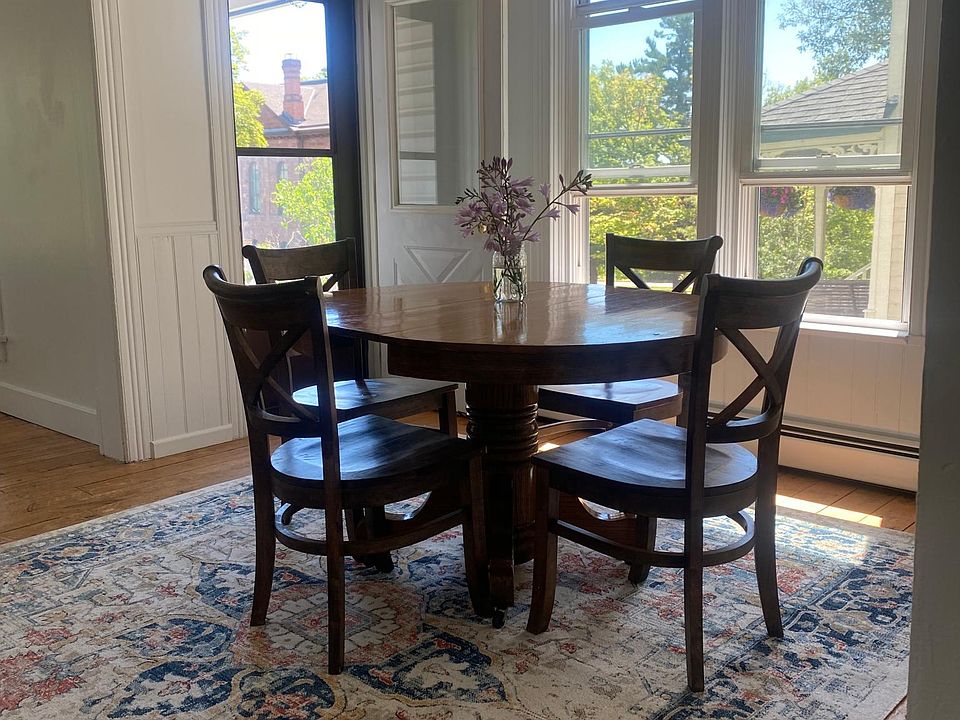 Dining room with table that can be extended to seat 6 comfortably.