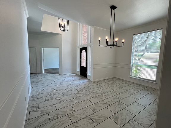 Entry, Formal Dining, & Private Office. Tiled and New Vinyl.