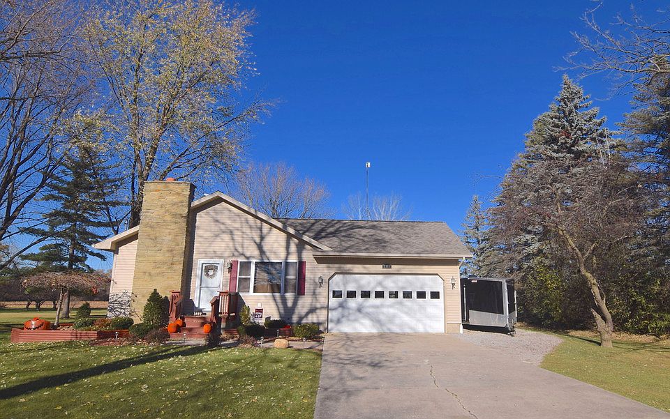 Looking to spread out and be just outside of the city?  This ranch on over half an acre is the place for you!brbrThis 3 bedroom ranch boasts a 2 car attached heated garage, new kitchen with granite and high-end cabinets, new paint throughout, updated bath, furnace and central air, updated roof and windows, 14x12 deck, city water, sump pump with city water backup system, large country lot with lots of parking.