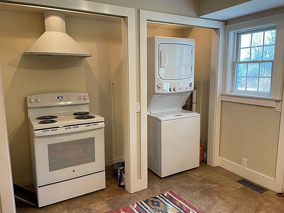 New washer, dryer, stove, and oven in unit