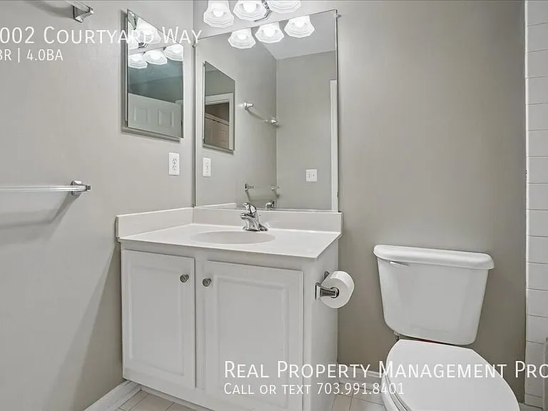 7002 Courtyard Way — Photo 25