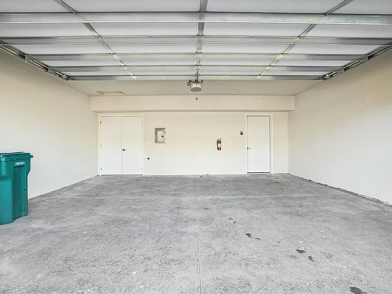 Double car garage with remote openers