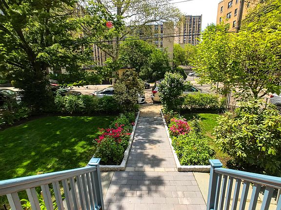 Luscious lawn kept cleaned and maintained.