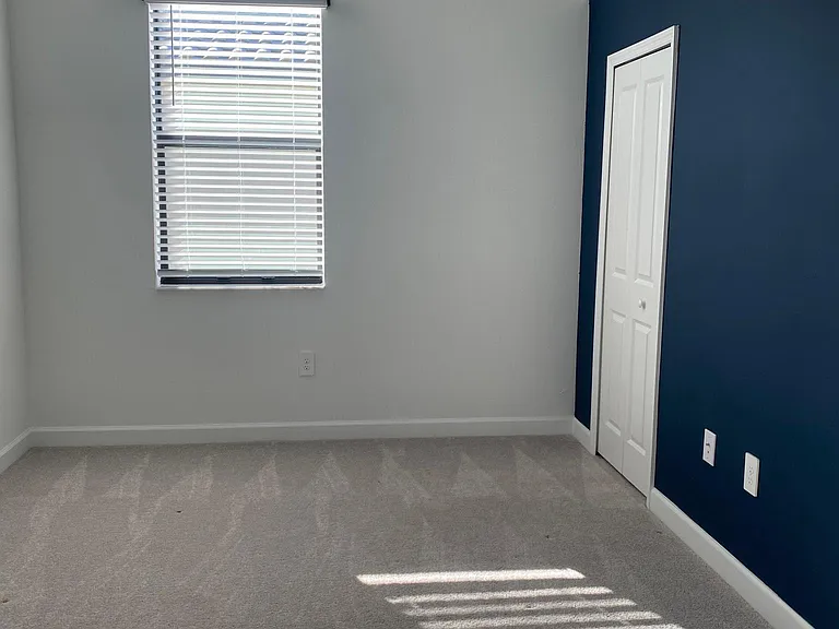 Third bedroom with access to a shared full bath