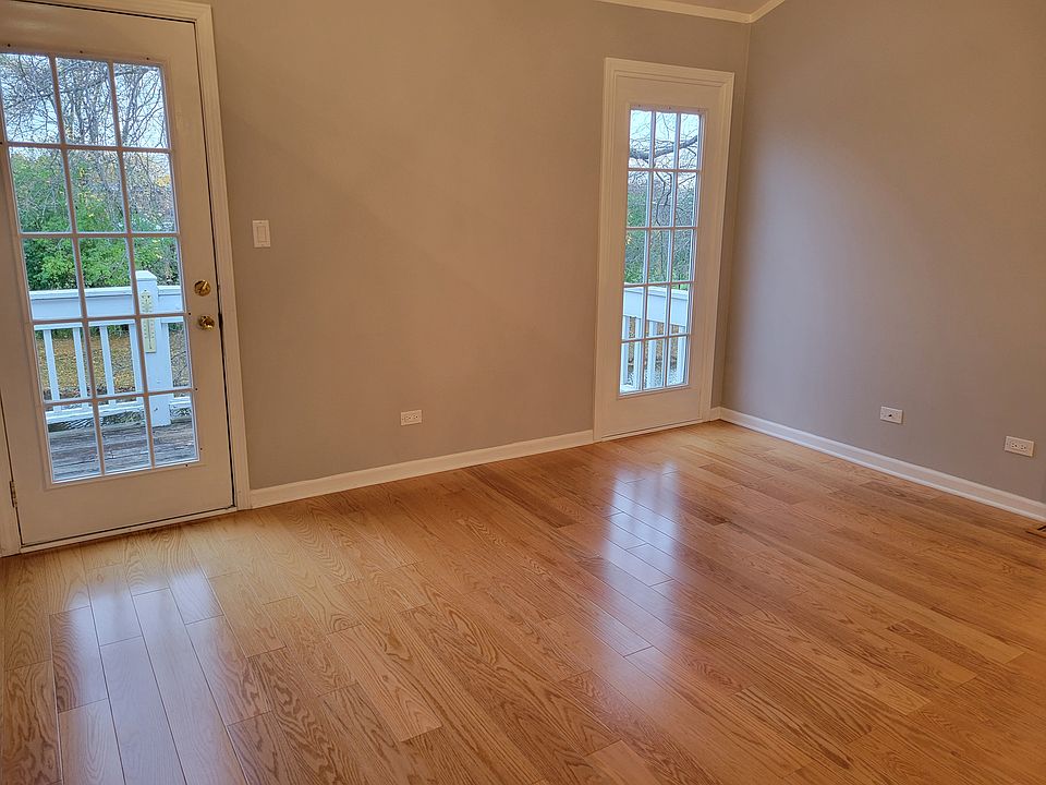Living room area w/ door to deck
