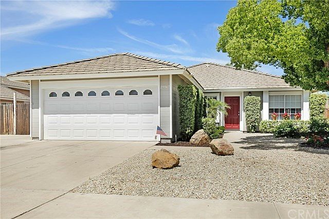 Gorgeous curb appeal with manicured front