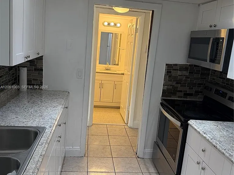 3246 N Pine Island Rd #101 — Photo 23