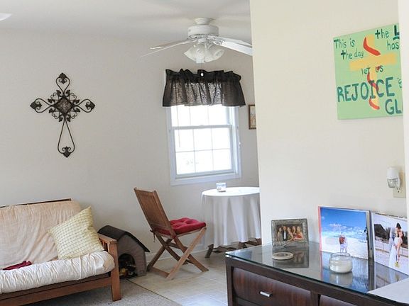 Living room looking into dining area.