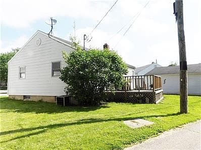 View of the 2 car garage. In town living in this quiet cul-de-sac off Market St.