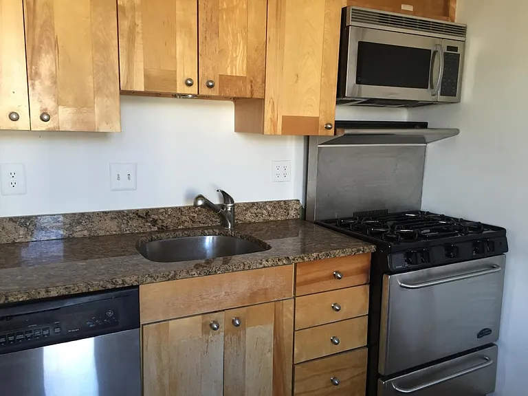Chefs kitchen with granite counters and stainless steel appl