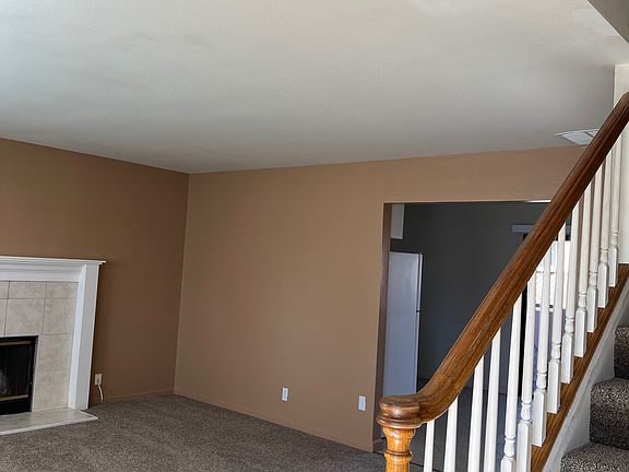living room / opening to eat in kitchen
