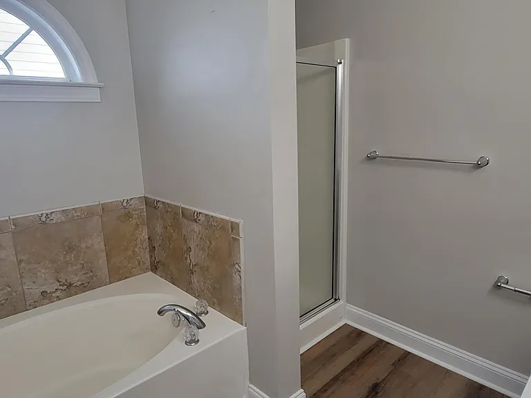 Master Bath Soaking Tub and Separate Shower.