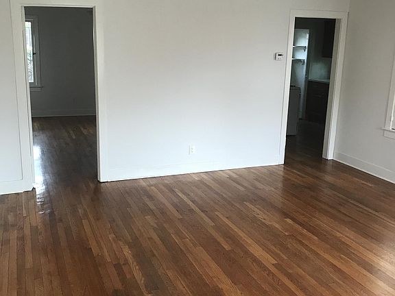 Livingroom w/ original hard wood floors