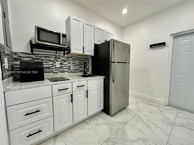 1309 NW 55th Ter #STUDIO — Photo 1
