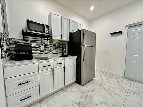 1309 NW 55th Ter #STUDIO Photo 1 1309 NW 55th Ter #STUDIO Photo 1