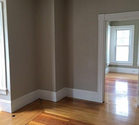 Living room - Hardwood floors and tin ceilings