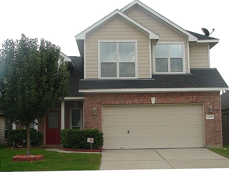 The doublewide driveway will accommodate your visitors with ease.