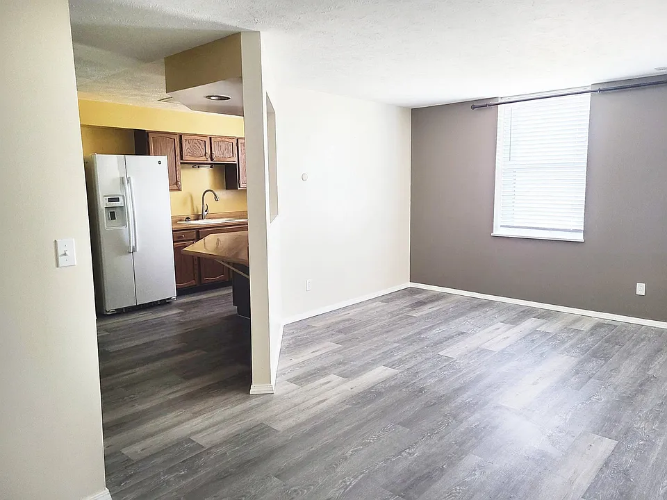 Living room and kitchen entrance of a unit at Francis Villas.