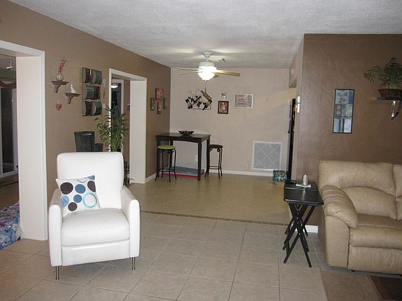 Living room looking into kitchen area
