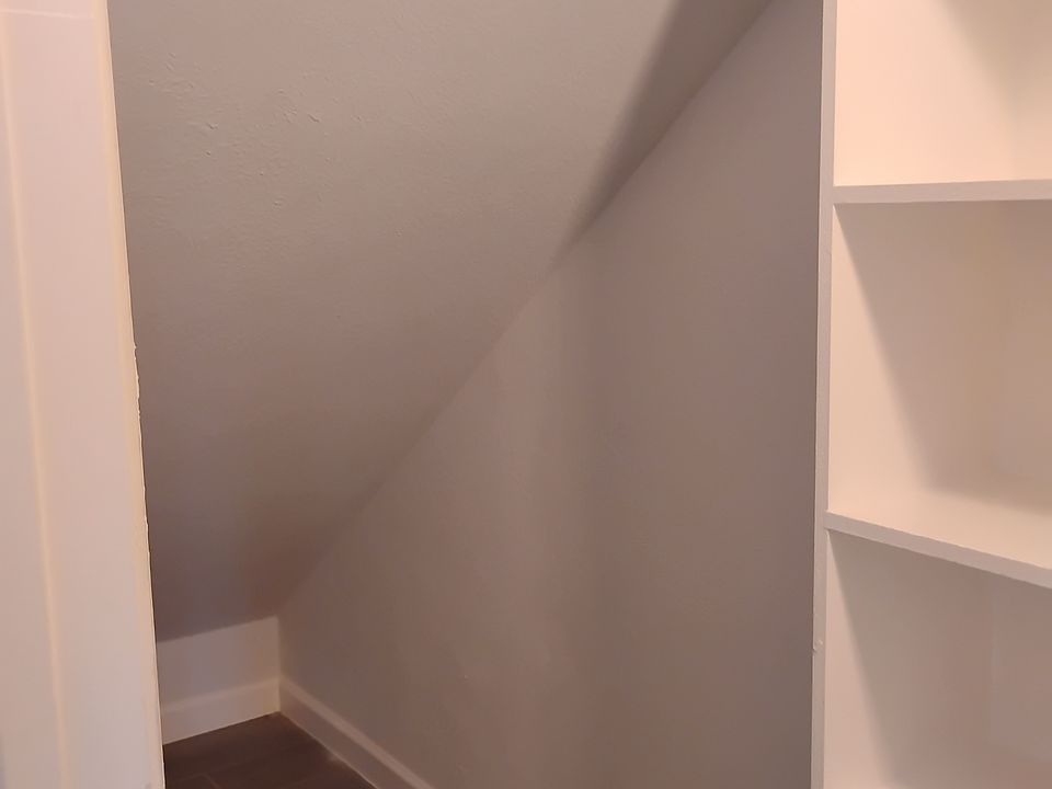 Under the staircase large closet