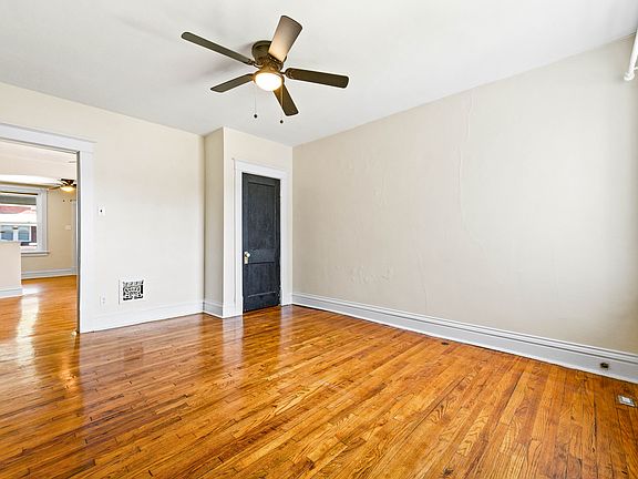 Bedroom with storage closet door
