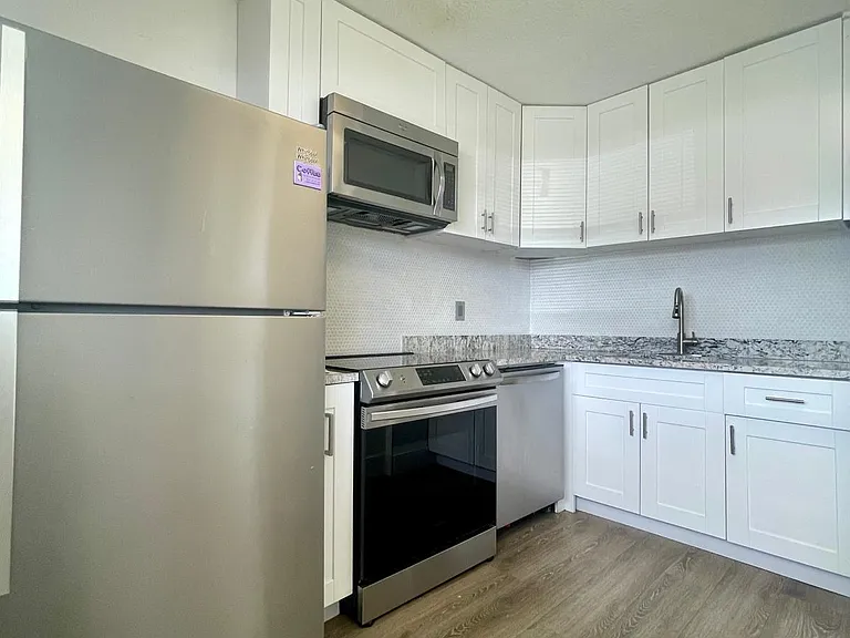 651 NW 42nd Ct #118 — Photo 3