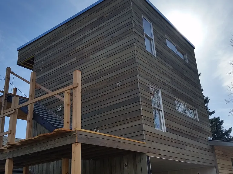 2 studios on top of each other. Below them is the carport.