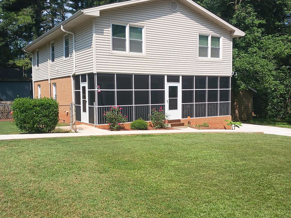 front of duplex + screened in porch
