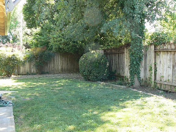 Fully fenced backyard w/covered patio