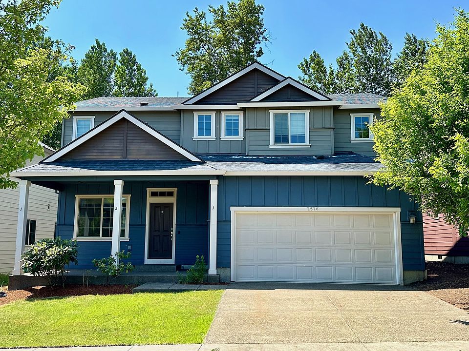 FRONT with beautiful trees and yard
