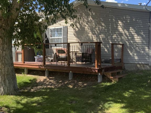 There is a large furnished back deck to sit and unwind while enjoying the fresh Colorado air and views of Meadow Park.