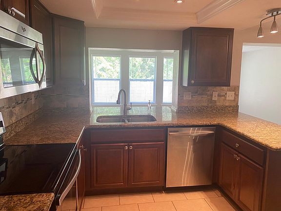 Granite Counters, Stainless Appliances, Double Bowl SS Sink