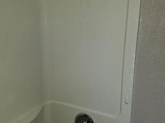 NEW SHOWER HEAD AND PLUMBING