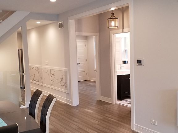 5th image of 4134 N Menard Ave