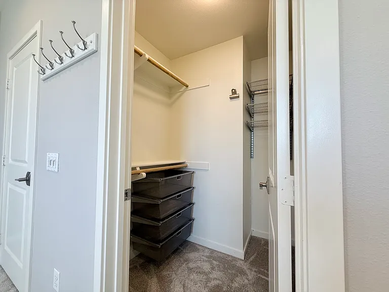 Closet 2 of 2 in primary bedroom