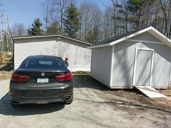 side of home with private storage