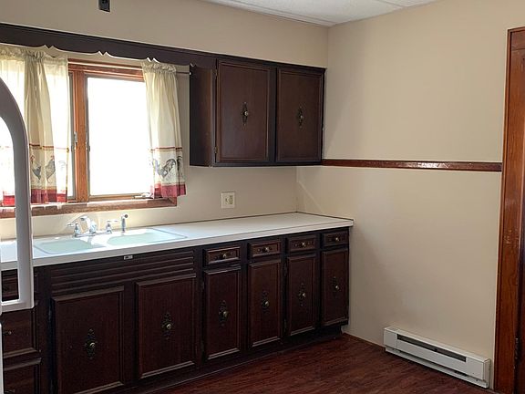 Kitchen with refrigerator and stove (new) supplied