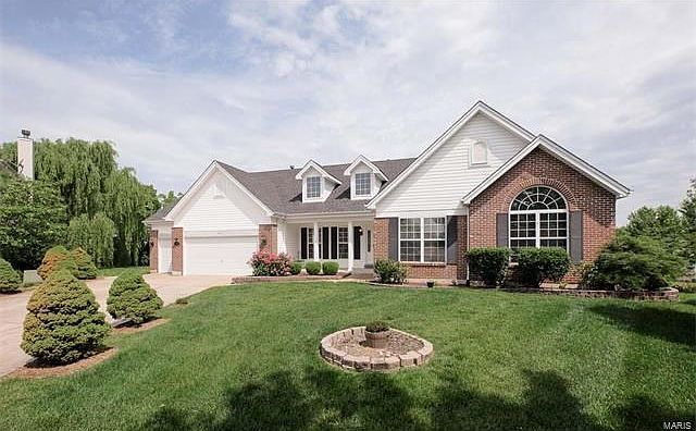 Walkout, open floor plan ranch nestled in a quiet cul de sac- new roof!
