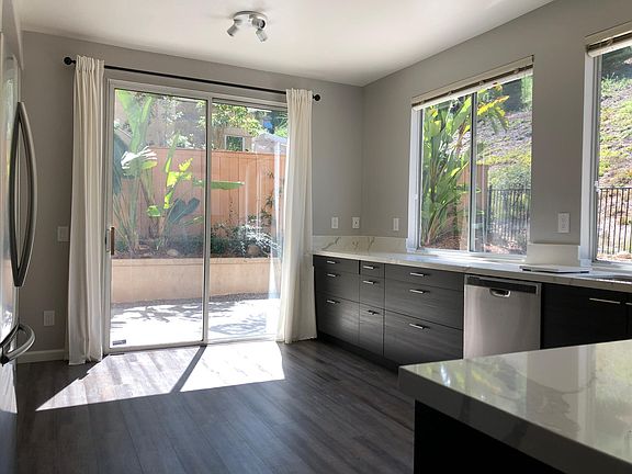Sliding door leading to the side yard.