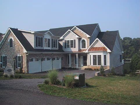 Front view - 3 car garage