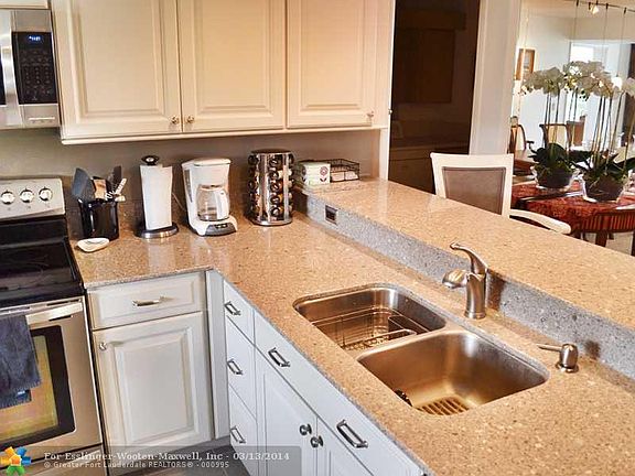 Dual Balcony Penthouse Unit Overlooking Pond and Pool