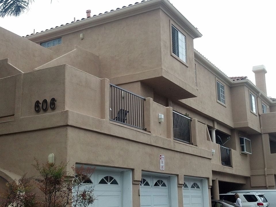 Front view; upstairs unit and patio