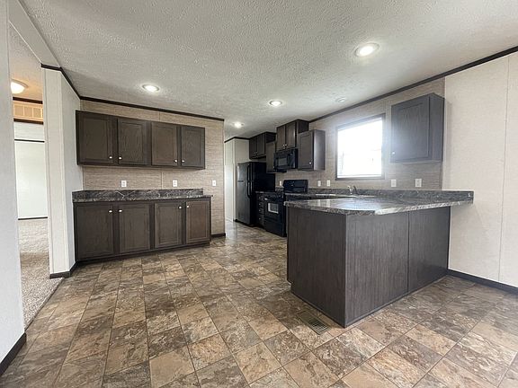 3rd image of 7204 E Grand River Ave Lot 199