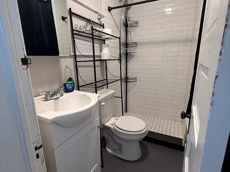 Bathroom off of the kitchen.