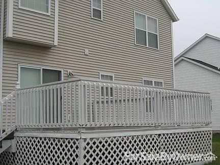 Back of the house plus deck