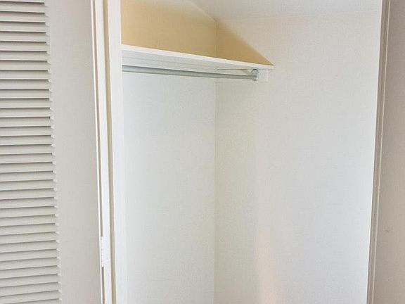 Bedroom 1 walk in closet angle 1