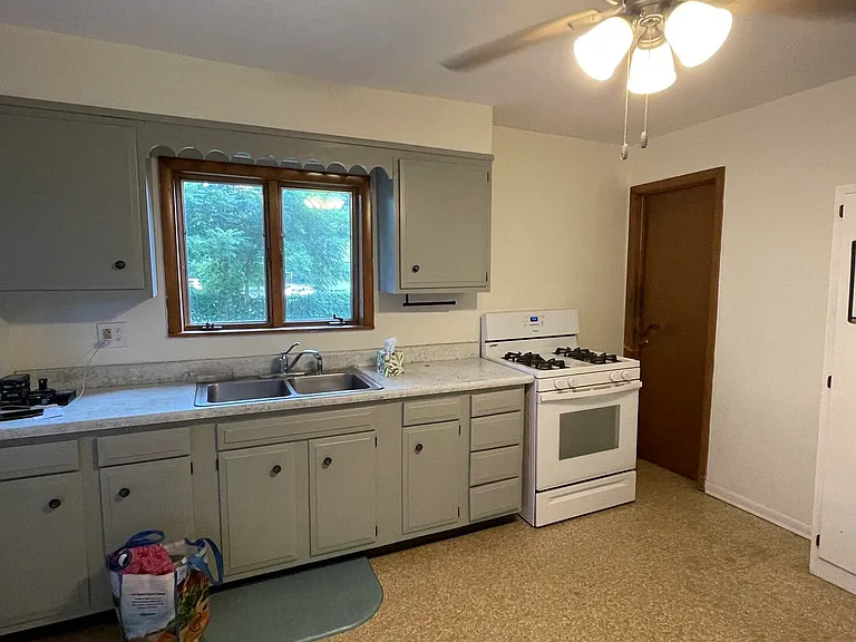 110 Utica St — Photo 14