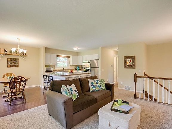 Another angle of the living room, dining room and kitchen area.