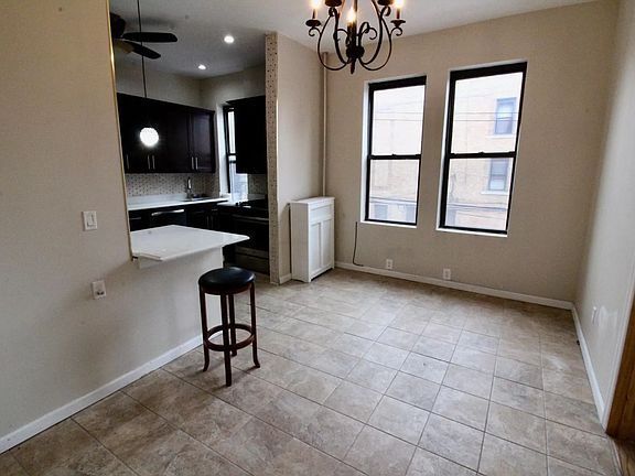3rd image of 54-43 Metropolitan Ave #5FAM